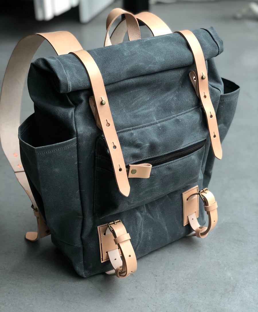 Image of Yoga backpack in waxed canvas with zipper pocket and double yoga straps