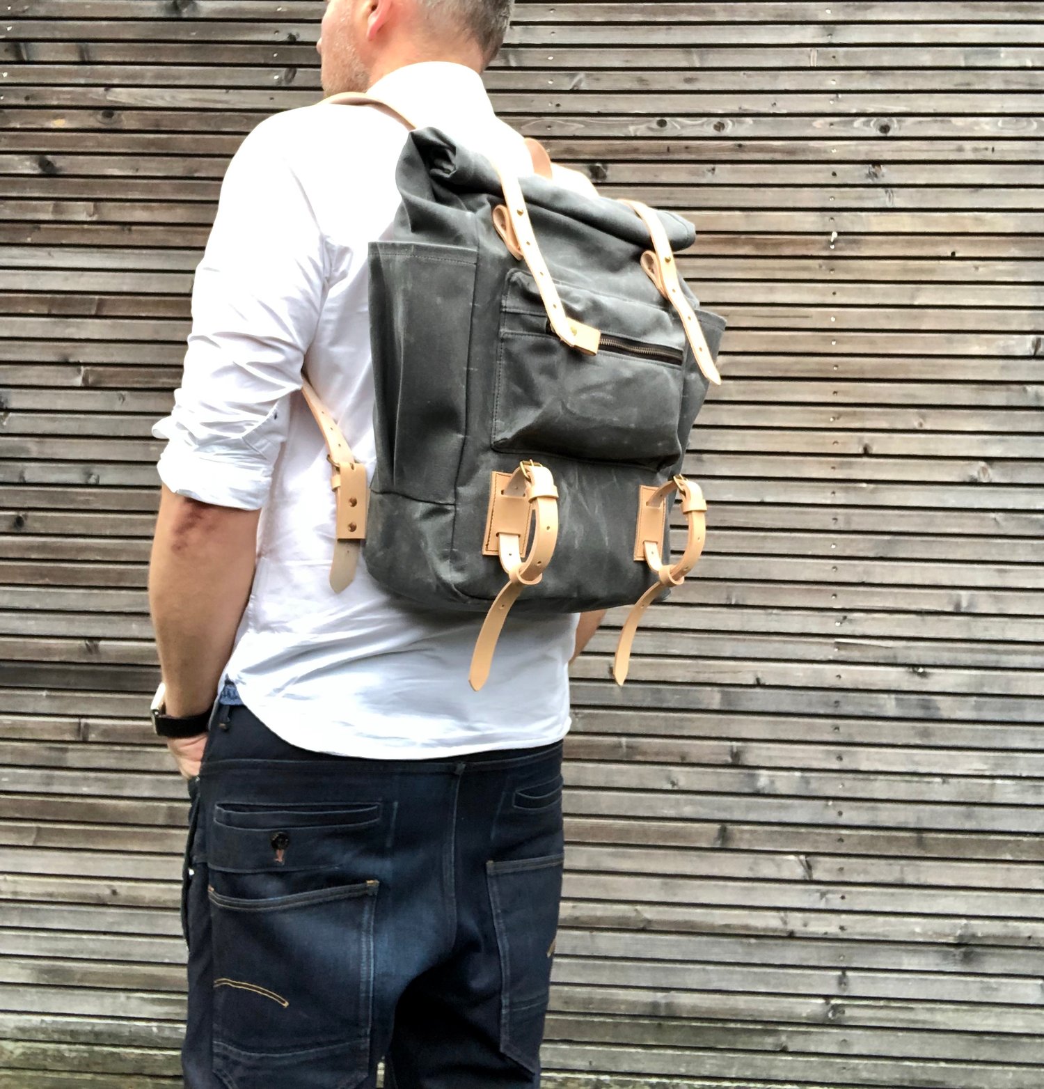 Image of Yoga backpack in waxed canvas with zipper pocket and double yoga straps