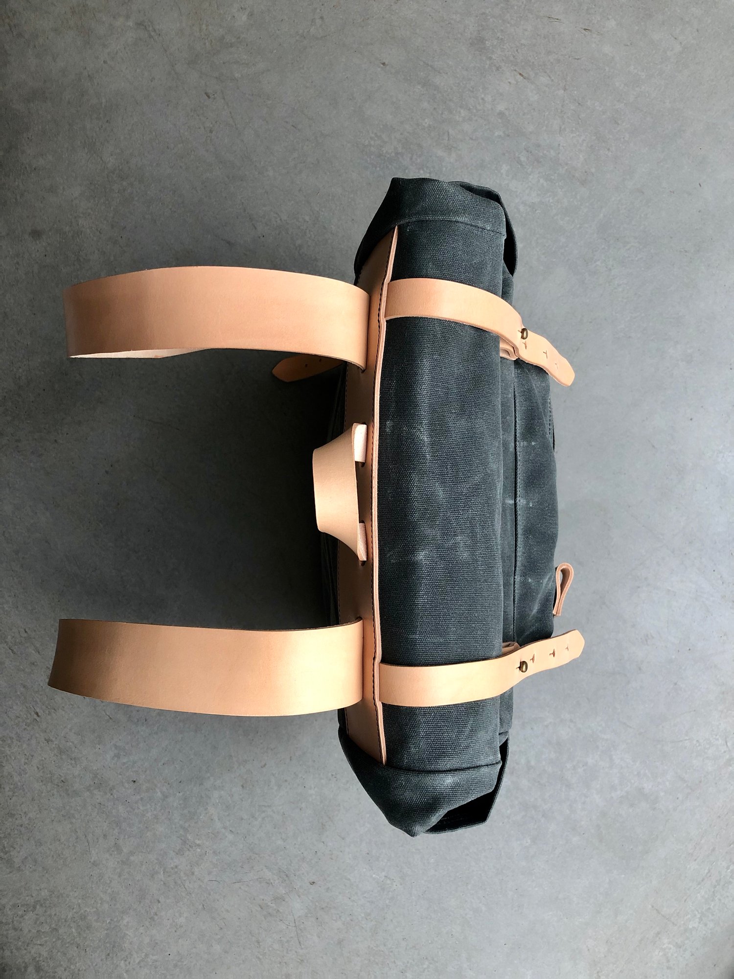 Image of Yoga backpack in waxed canvas with zipper pocket and double yoga straps