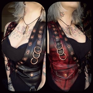 Image of black/red stained vest with details