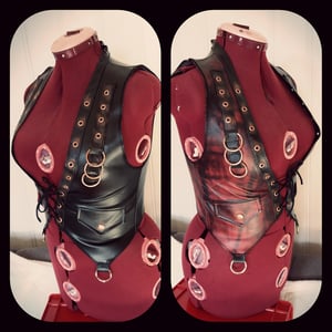 Image of black/red stained vest with details