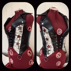 Image of fauxleather vest with stars and lightningbolts