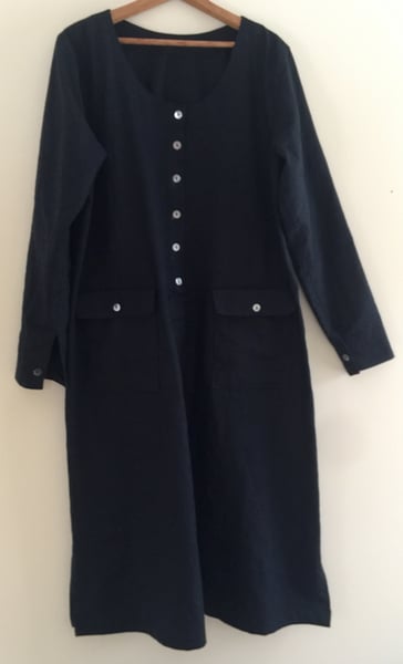 Image of placket shirt dress with flap pockets