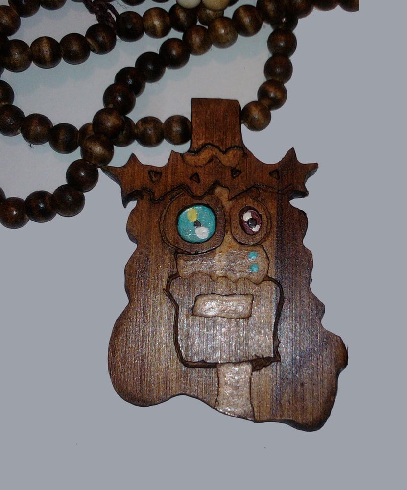 wooden jesus piece necklace