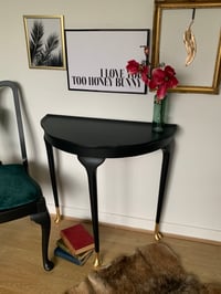 Image 3 of Black half moon with gold leaf feet.