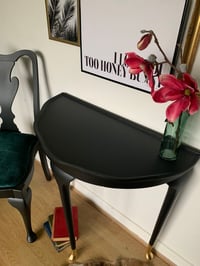 Image 5 of Black half moon with gold leaf feet.