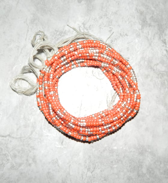 Image of Red and Clear Tie Waistbead 