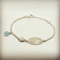 Image 1 of Bracelet with name tag