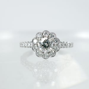 Image of Diamond floral cluster ring. PJ5687