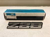 NOS 1982 Camaro Z28 Ground Effect Emblem Triple Silver 20336586