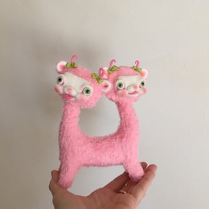 Image of Peaches and Punch the Tiny Two-Headed Yak