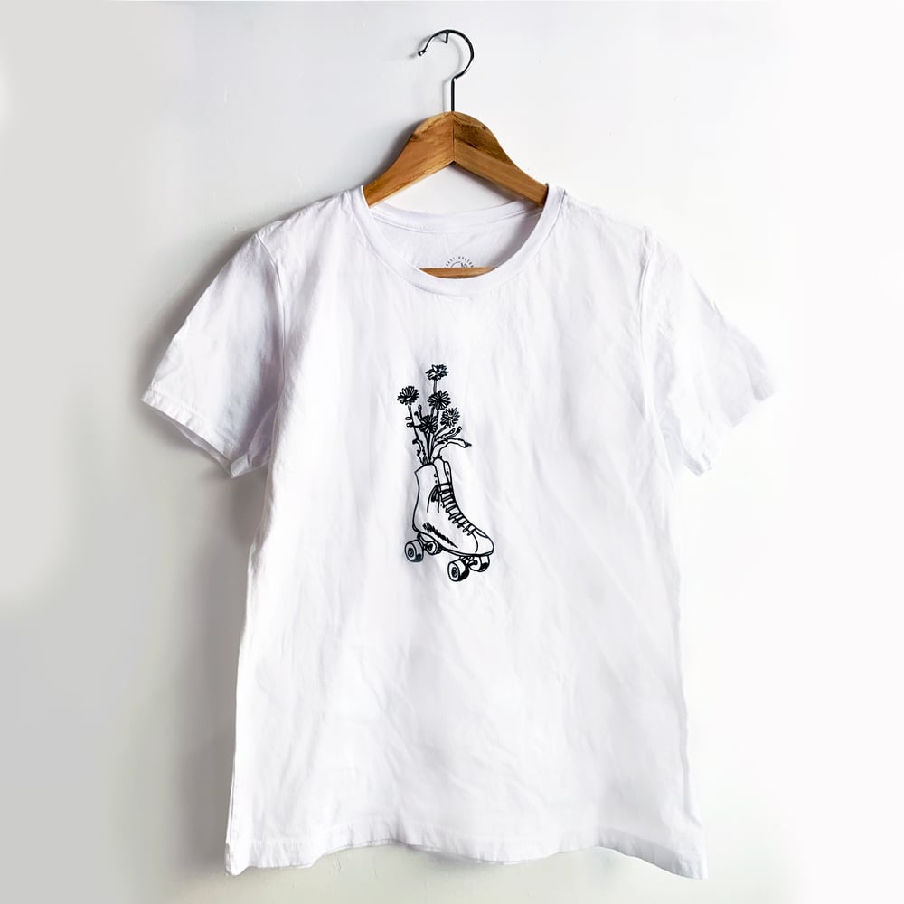 Image of ROLLER SKATE FLOWER WOMAN'S TEE / COLLAB WITH COAST MODERN - WHITE