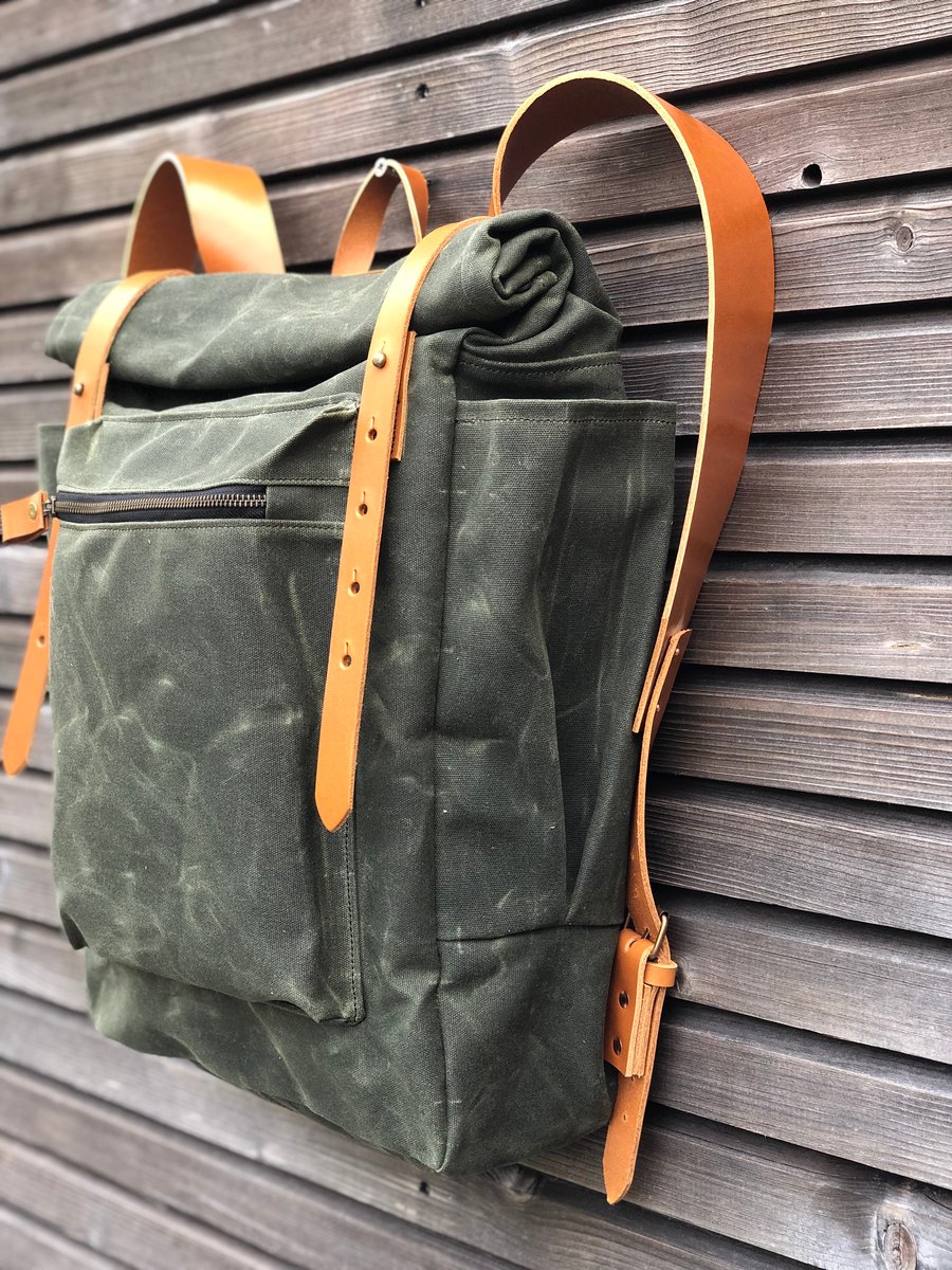 Image of Waxed canvas backpack with roll to close top and vegetable tanned leather shoulderstrap