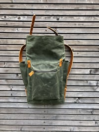 Image 4 of Waxed canvas backpack with roll to close top and vegetable tanned leather shoulderstrap 