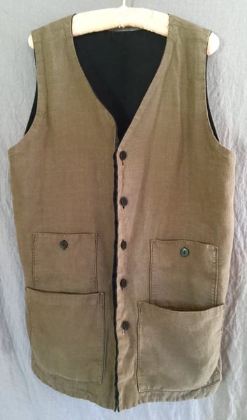 Image of reversable pocket vest