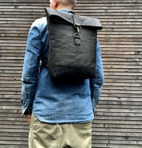 Image 1 of Vegan backpack in Piñatex™ and waxed canvas medium size with folded top
