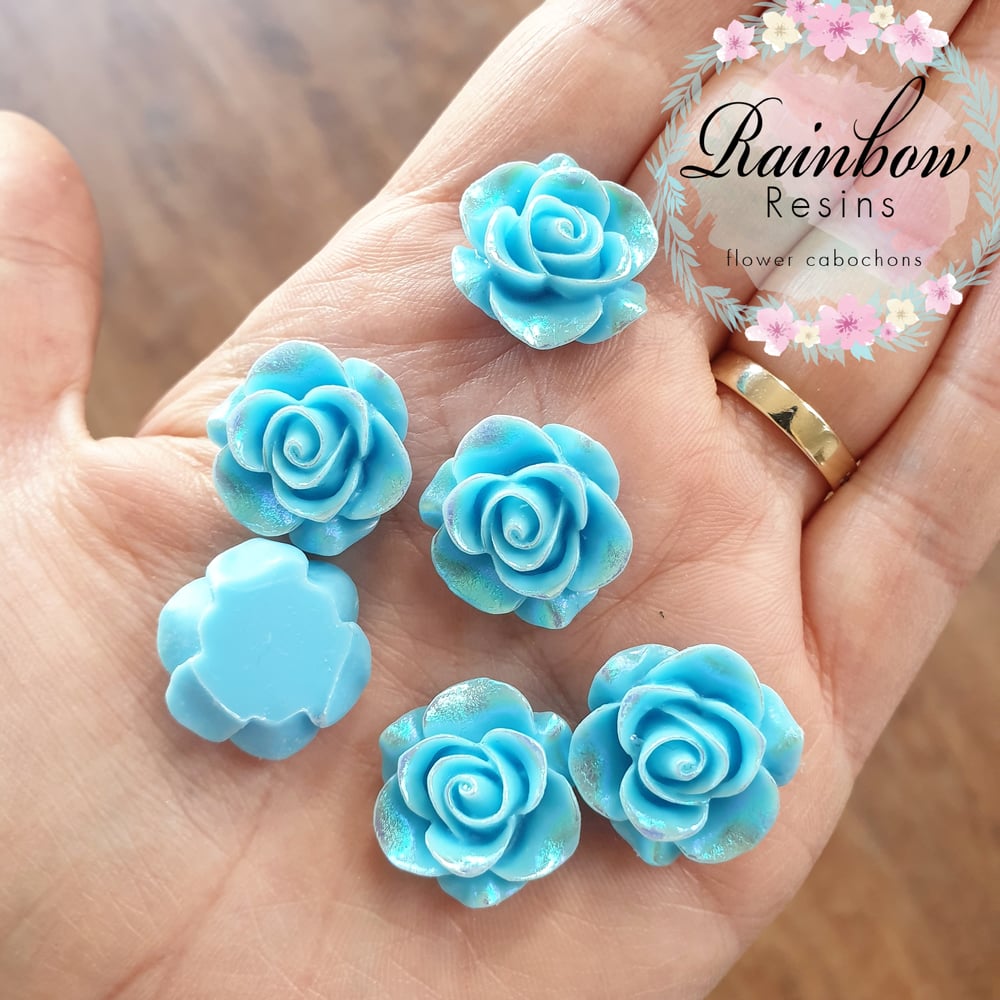 Image of Sky blue roses with an AB coating x 10