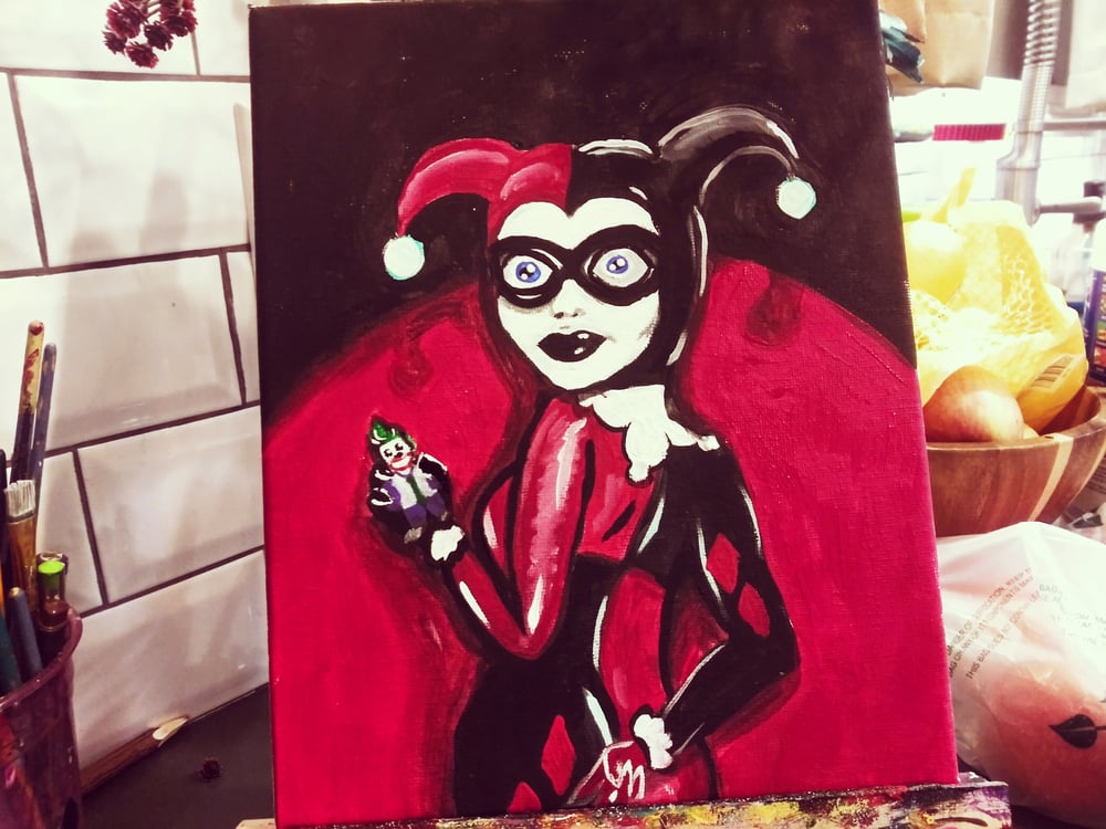 Image of Creepy harley quinn and her joker doll