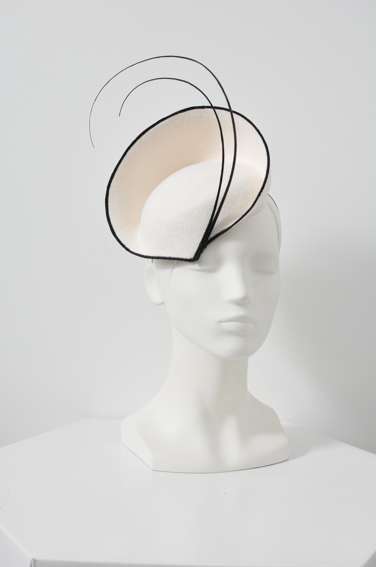 Image of felt headpiece with quills