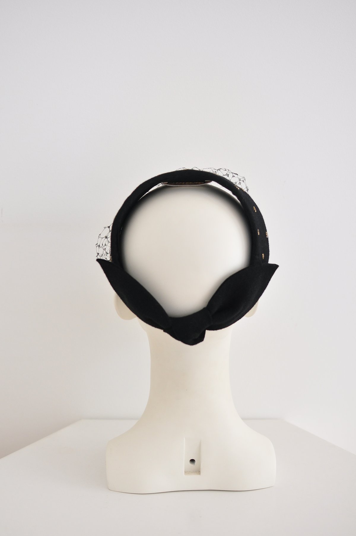 Image of felt bow headpiece