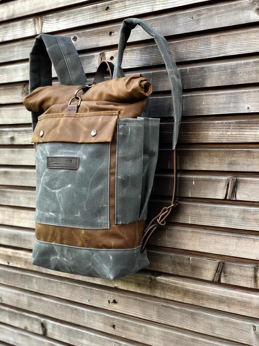 Image of waxed canvas backpack / medium size backpack / waterproof backpack with padded shoulder straps and w