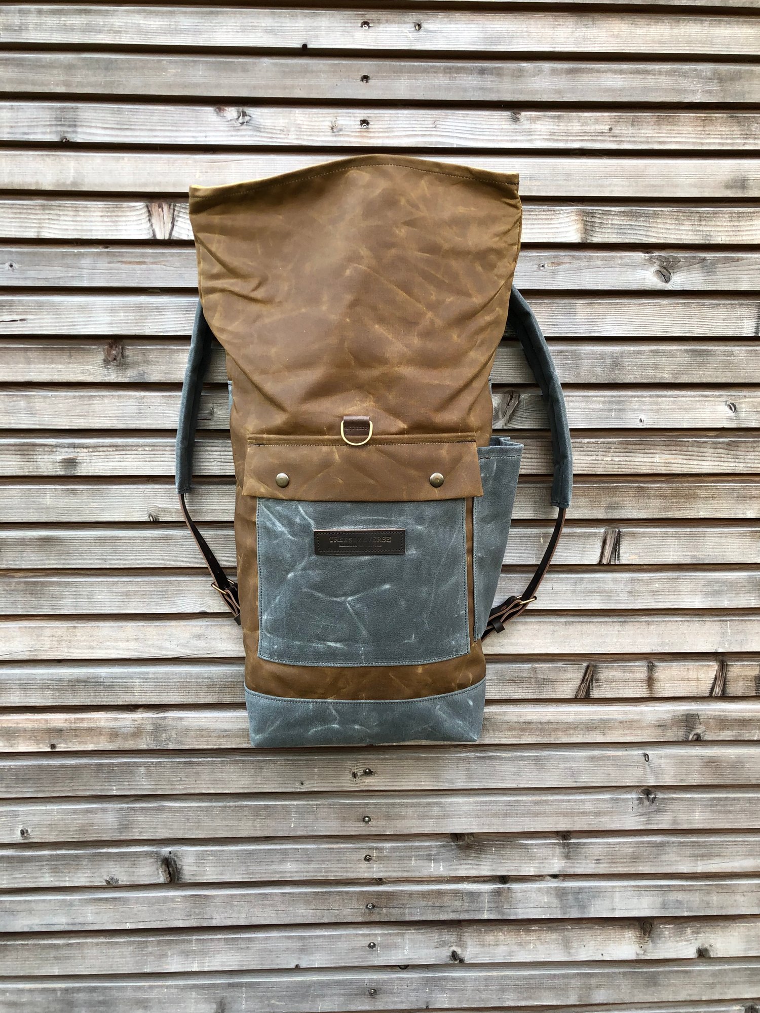 Image of waxed canvas backpack / medium size backpack / waterproof backpack with padded shoulder straps and w