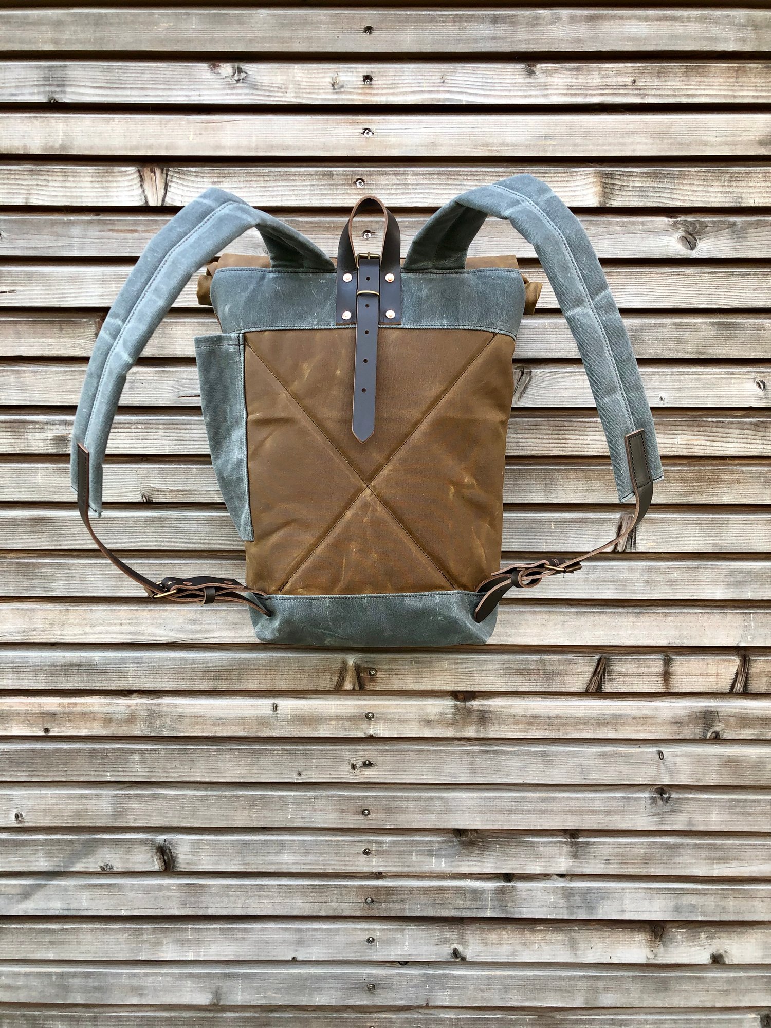 Image of waxed canvas backpack / medium size backpack / waterproof backpack with padded shoulder straps and w