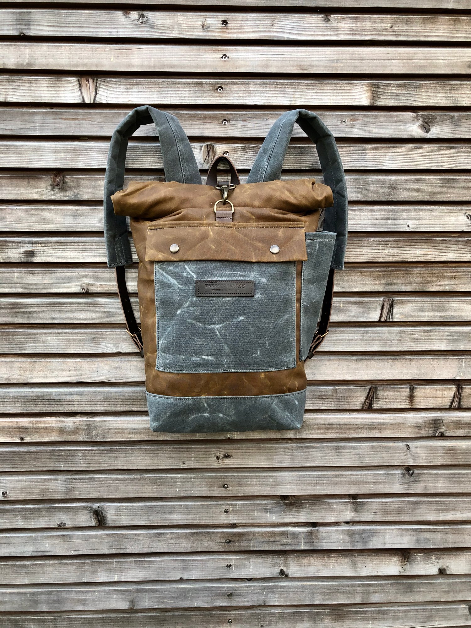 Image of waxed canvas backpack / medium size backpack / waterproof backpack with padded shoulder straps and w