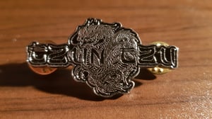 Image of Tzun Tzu logo metal pins