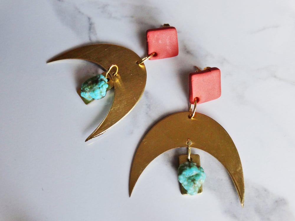 Image of terracotta clay + brass + turquoise