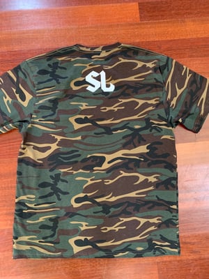 Image of “Lo Que Sea” camo Tee