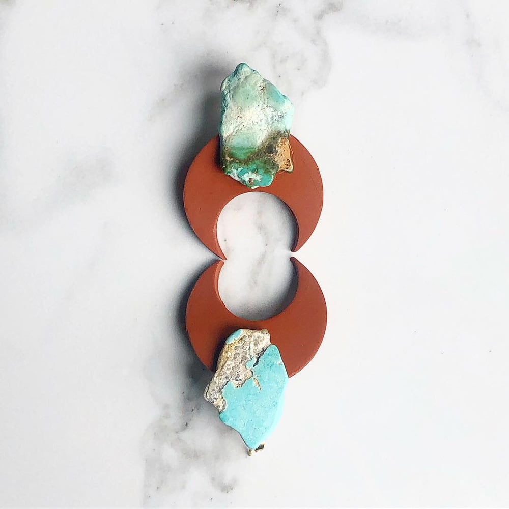 Image of terracotta clay + raw turquoise