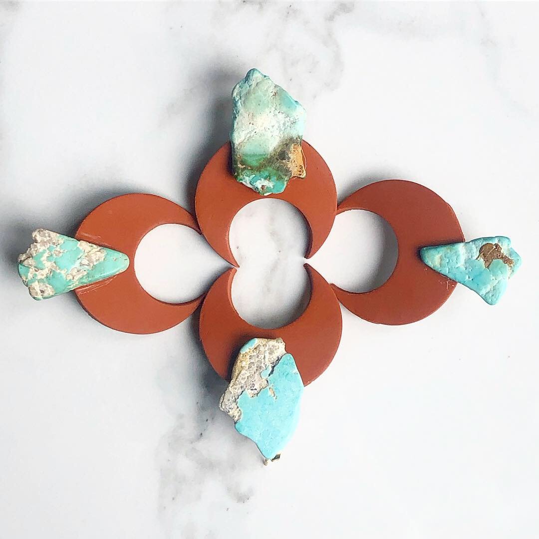 Image of terracotta clay + raw turquoise