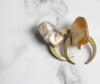 thin brass moons + stone