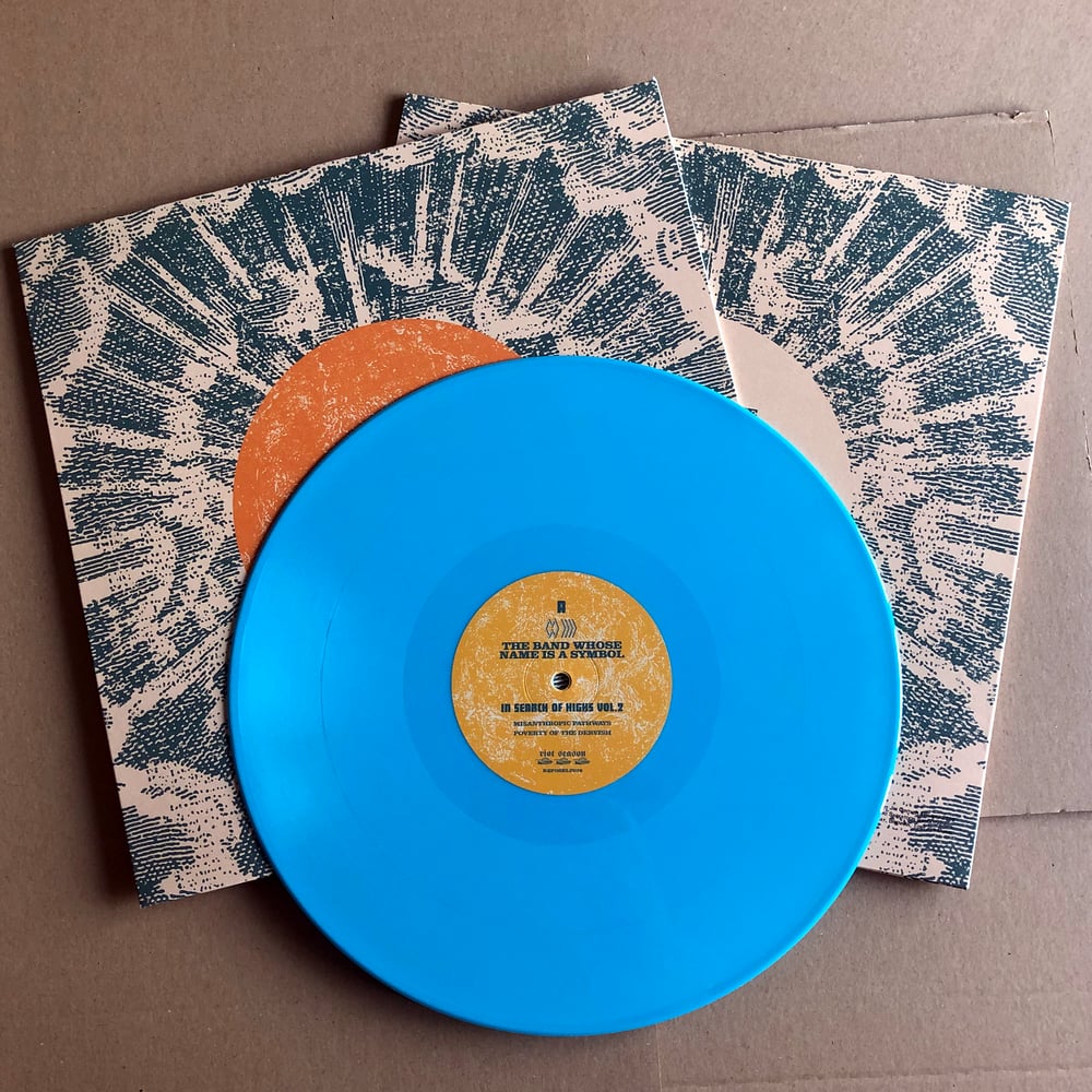 THE BAND WHOSE NAME IS A SYMBOL / SHOOTING GUNS 'In Search Of Highs Vol 2' Blue Vinyl LP