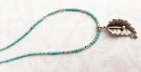 Image 3 of Tiny Turquoise and Silver Fauna Necklace