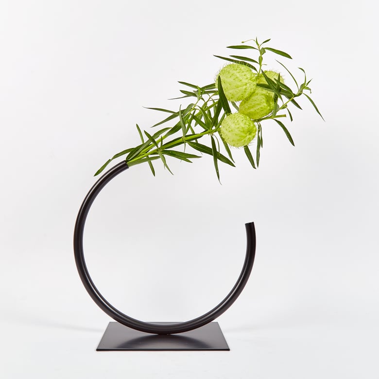 Image of Medium, BLACK Edging Over Vase