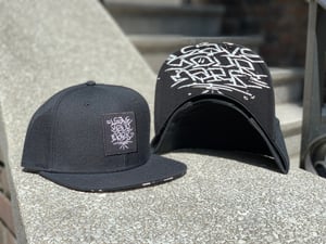 Leave Your Mark Shop Snap Back Hand Style Hat 