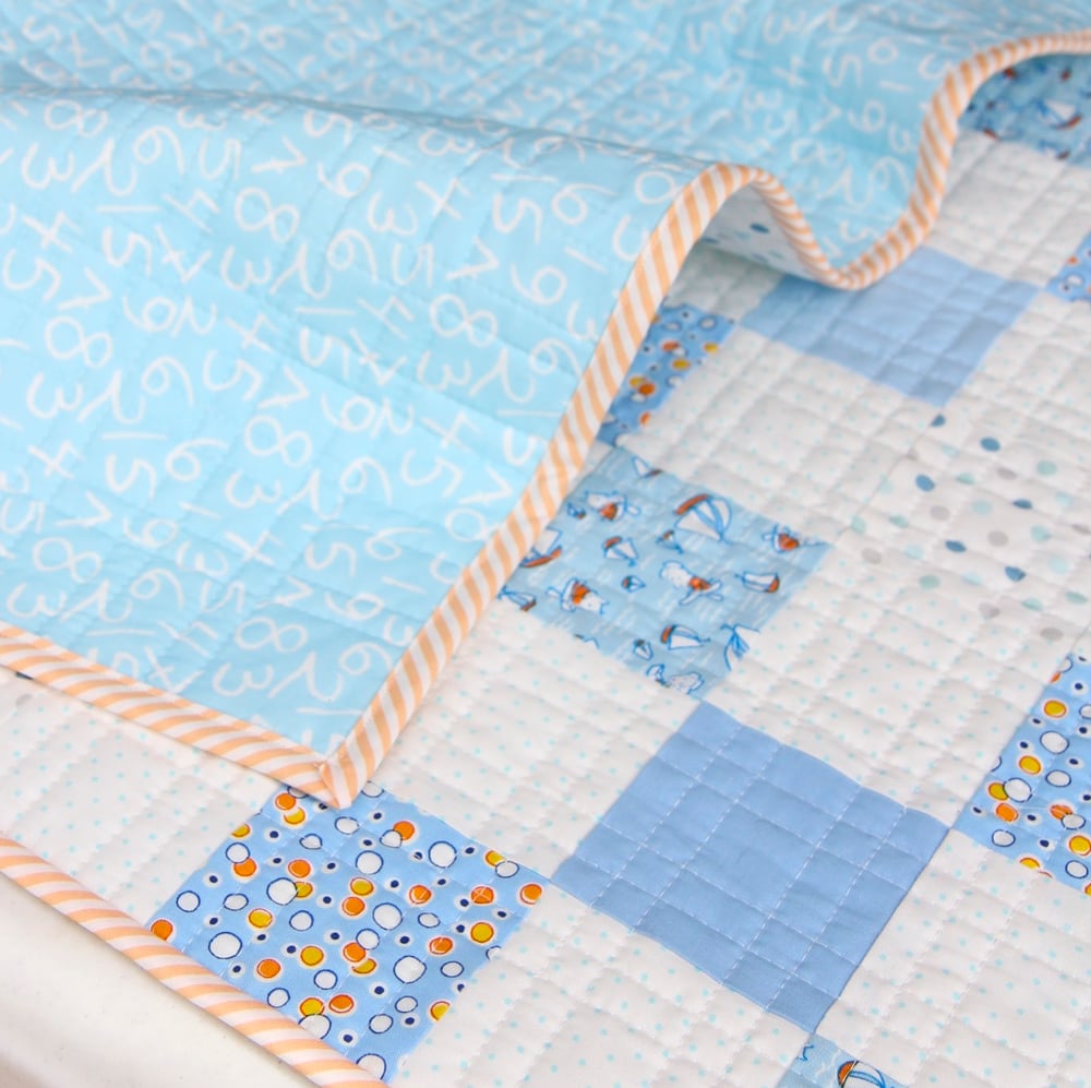 Image of Storybook Vacation Baby Quilt