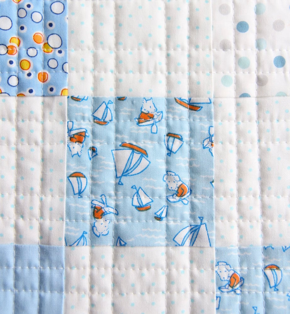 Image of Storybook Vacation Baby Quilt