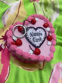 Image 1 of Always tired keychain 