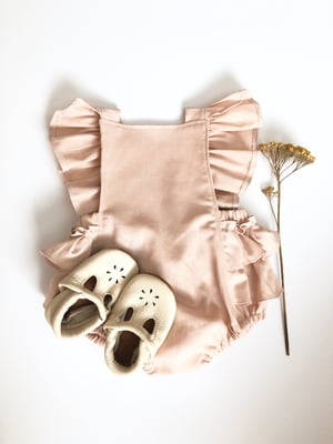 Image of Linen ruffle romper in peachy blush 