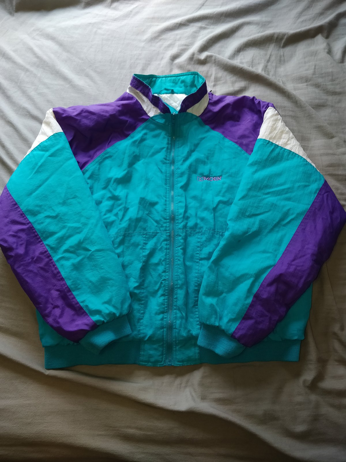 Teal and sale purple jacket