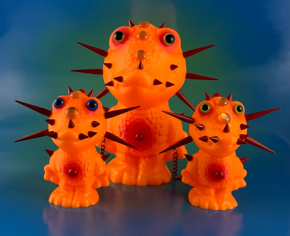 Image of Orange Crocs with Red Rubber Coated Spikes 