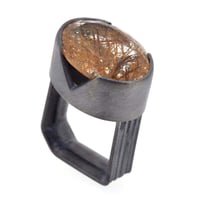 Image 1 of Monolith ring, 17.5ct rutile quartz in a cutaway bezel setting in oxidised silver