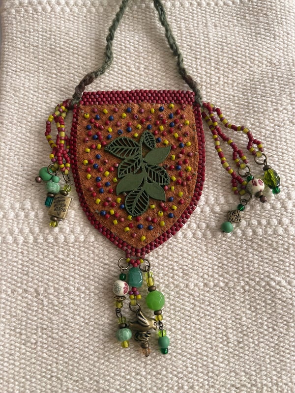 Image of GROWING GRACE POUCH NECKLACE 