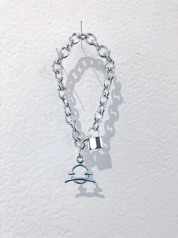 Image of lil frowny chunky charm bracelet