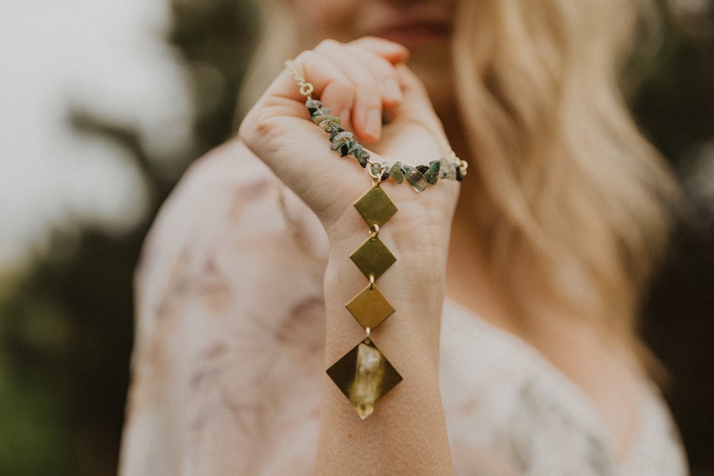 Image of stone + brass long drop necklace