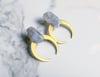 thin brass moons + stone