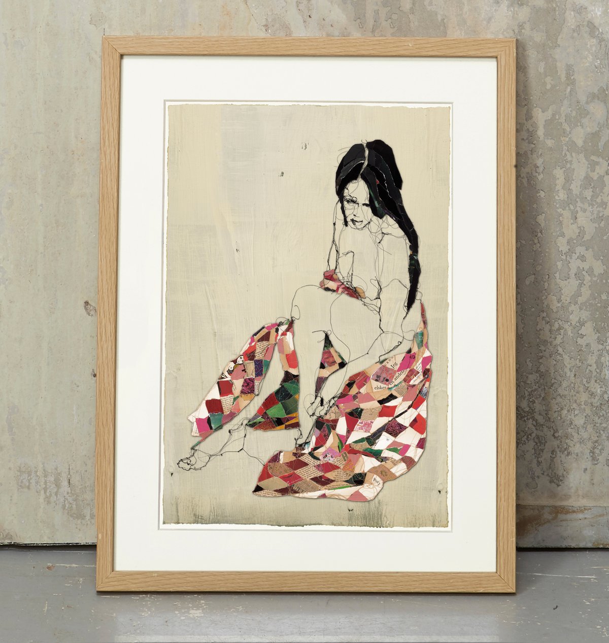 Image of Melancholic woman in red blanket